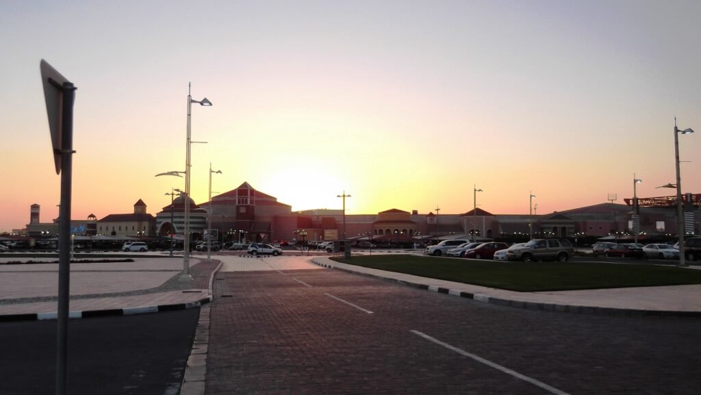 Aspire Park at sunset near Villaggio Mall