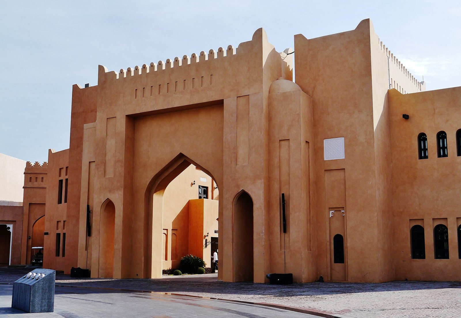 Arched sandstone buildings on Katara Square