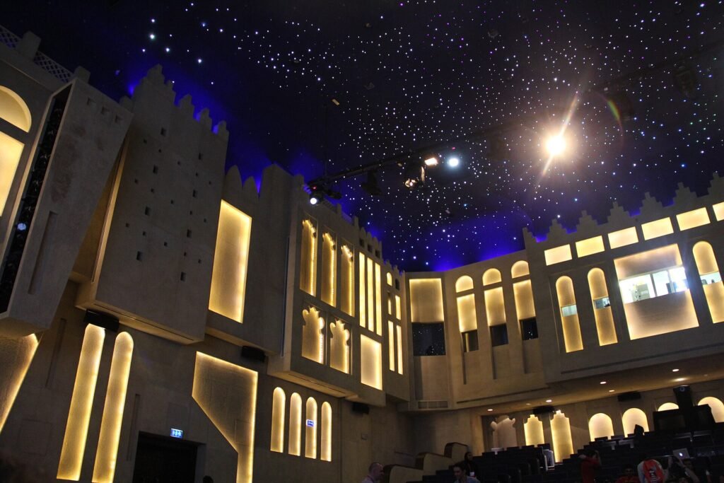 The Katara Drama Theatre lit up at night