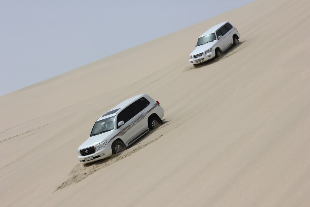 4x4 vehicles dune bashing on the way to the Inland Sea