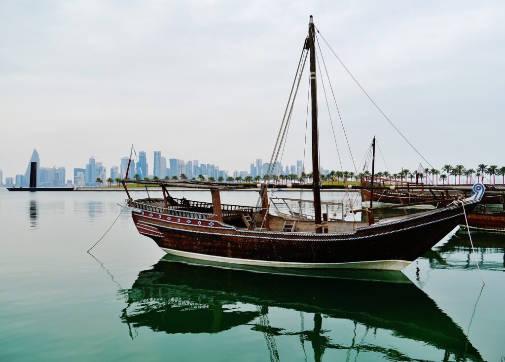 A traditional dhow moored off MIA Park