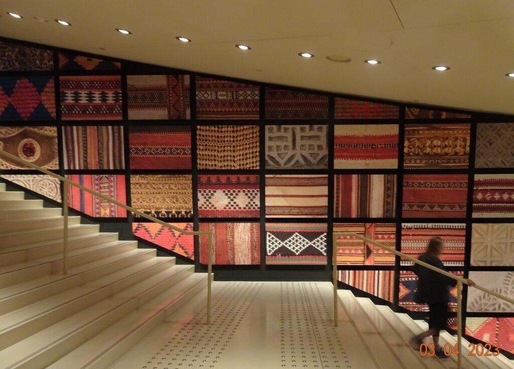 A wall of woven textiles in the National Museum of Qatar