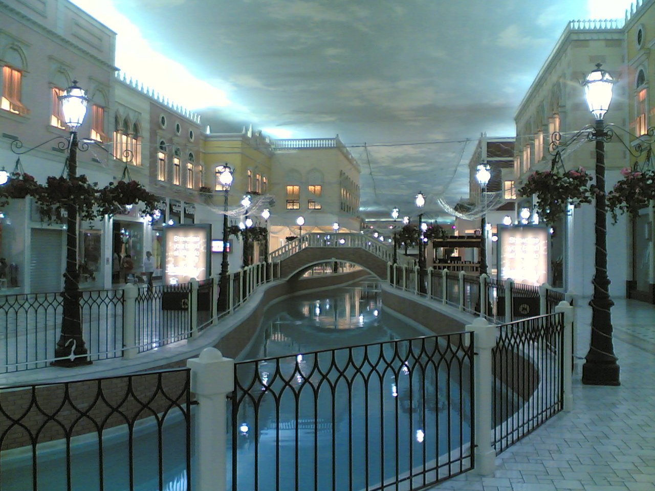 Canal and shopfronts inside Villaggio Mall
