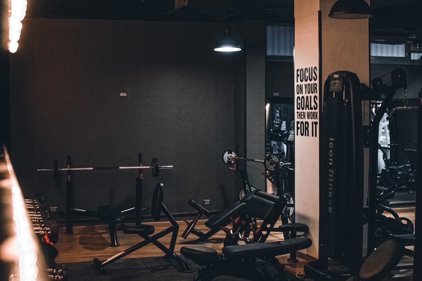 Gym interior with a row of exercise machines